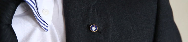 gideon badge on a suit lapel